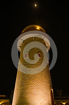 Verona shopping brick tower night