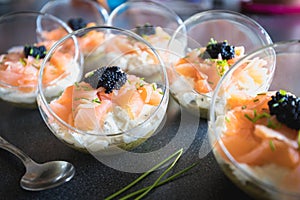 Verrine salmon lumpfish egg fresh cheese and avocado bed