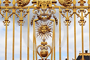 Fragment of the gilded fence of the Palace of Versailles, France