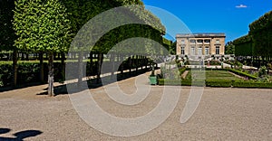 Versailles, Paris, France, 30 June 2022. Beautiful shoot along the gardens of the Petit Trianon. Beautiful summer day. People walk