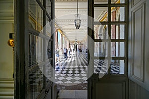 Versailles, Paris, France, June 2022. Stunning viewpoint shot from inside the Peristyle of the Grand Trianon with wide angle lens