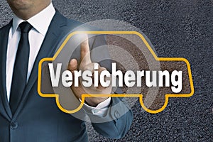Versicherung (in germn insurance) car touchscreen is operated by photo