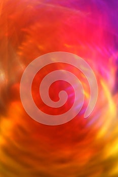 Vertical abstract background with staggered and refracted vortex light effects