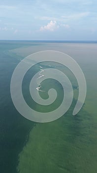 Vertical Aerial Footage of Confluence of Seawater and Freshwater in the Waters of Gorontalo, Indonesia. Halocline in the water.