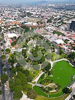 Vertical Aerial Shot: Parque Alcalde with Glorieta Normal and Neighborhood photo