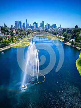 Vertical aerial view of the beautiful Echo Park Lake near the downtown Los Angeles skyline