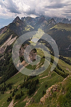 Vertical aerial view of the mountain Staubernkanzel and Lake Samtis in Switzerland