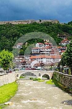 Vertical aerial view of old stone arch bridge over the river in Prizren, Kosovo