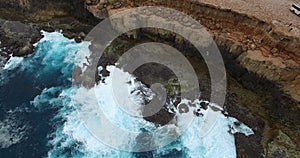 Vertical ascent from low level with large breaking waves to distant cliffs - Dirk Hartog Island, Shark Bay World Heritage Area