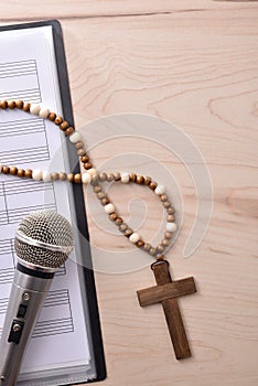 Vertical background detail of religious music with mic top