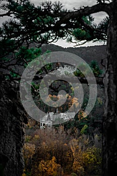 Vertical of a beautiful landscape in autumn with a display of Villa Eugen in Austria