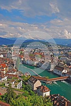 Vertical birds eye view city Lucerne, Switzerland with Swiss typical buildings looking down on the Spreuer Bridge over River Reuss