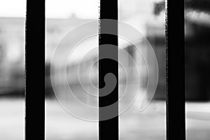 Vertical black and white prison cell bokeh background