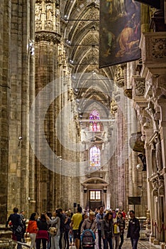Vertical of Center Nave columns and tile floor inside interior Duomo di Milano