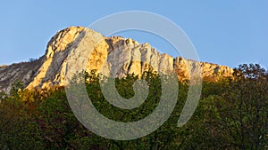 Vertical cliffs of a Miroc mountain at Djerdap National park photo