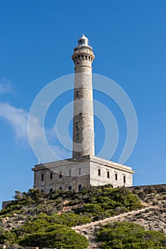 Vertical close up view of the Cape Palos lighthouse in Spain photo