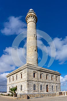 Vertical close up view of the Cape Palos lighthouse in Spain photo