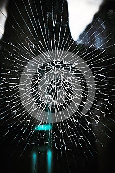 Vertical closeup of the cracked glass window