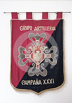 Vertical closeup of an Old identifying banner of the Spanish Campaign artillery group