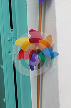 Vertical closeup shot of colorful pinwheels for children