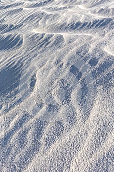 Vertical closeup shot of gypsum sand dunes at White Sands National Park, New Mexico