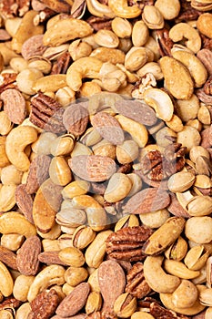 Vertical closeup shot of tasty salted mixed nuts