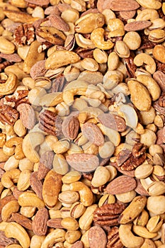 Vertical closeup shot of tasty salted mixed nuts