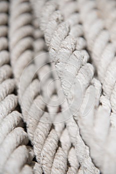 Vertical closeup shot of a white tight rope in Juan Lacaze, Uruguay photo
