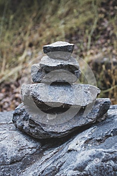 Vertical closeup of stones set on each other keeping perfect balance