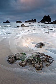 Vertical of a cloudy sunrise over the sea at Ecola State Park, Oregon, USA