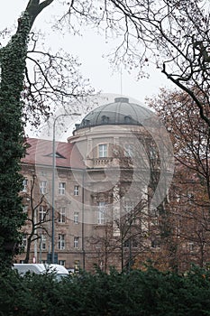 Vertical of the Collegium Maius school building on a gloomy, foggy day