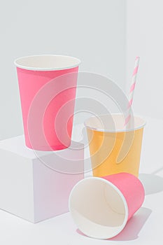 Vertical composition of bright paper disposable, compostable, recyclable cups