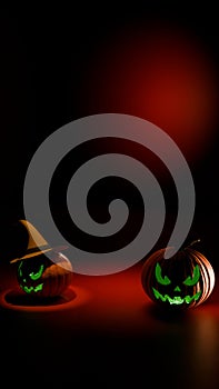 Vertical composition of glowing Halloween pumpkins with copyspace