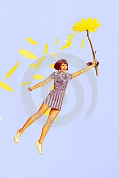 Vertical creative collage of young girl flying catch yellow daisy flower petals lightness carefree enjoy beautiful gift