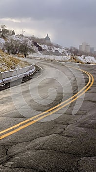 Vertical Damaged road with Utah State Capital Building view