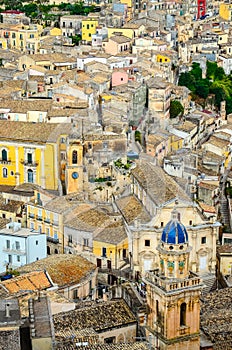 Vertical detail of colorful houses in old medieval village Ragusa in Sicily