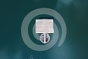 Vertical drone panorama of water dam or Vodna Nadrz in Nova Bistryca, Slovakia, detail of water overflow. Big water dam and