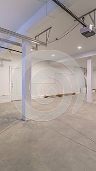 Vertical Empty cement garage interior with shining lights