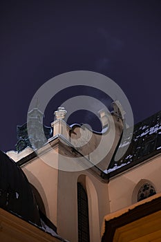 vertical evening winter cathedral architecture object walls and roof with smoke from chimney