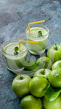 Vertical food banner smoothies apples and limes on a dark blue concrete background. Detox programm
