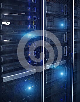 Vertical Format. Rows of server racks. Blue Technology Backfround.