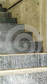 Vertical frame Close up of concrete treads of a staircase inside a commercial building