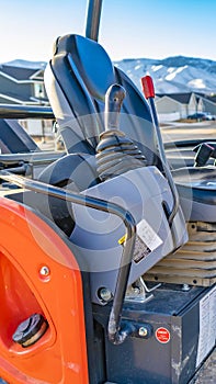 Vertical frame Interior of the open cab of a heavy duty construction machinery