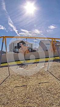 Vertical frame Set of A-frame swings on a kids playground