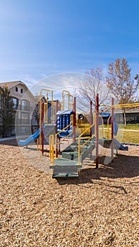 Vertical frame Small kids playground in an urban park