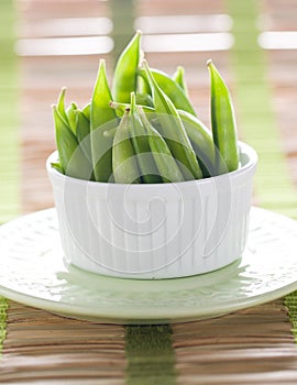 Vertical Green Beans Pods on Bamboo Placemat