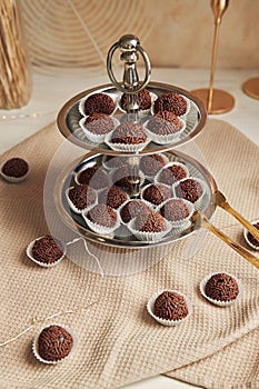 Vertical high-angle shot of delicious Brazilian Brigadeiros with choco ballshocolate lovers