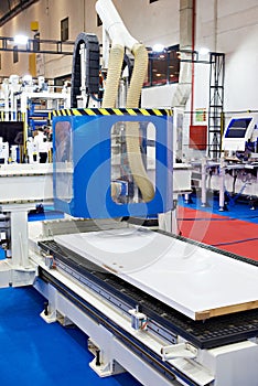 Vertical and horizontal milled CNC door processing machine