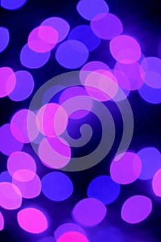 Vertical Image of Abstract Blurred Purple and Pink Illuminated Decorating Light