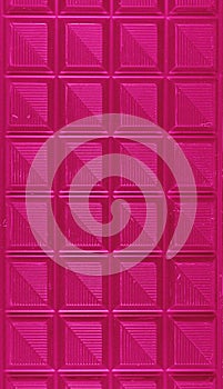 Vertical Image of Chocolate Bar in Shocking Pink Color for Background, Banner, Pattern